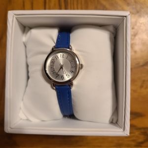 Young woman's blue watch